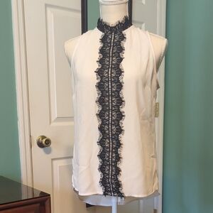 White House Black Market Ruffled Black and White Blouse